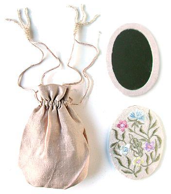 handheld-mirror-in-a-little-sac-m230-nyc-usa-monogram.jpg