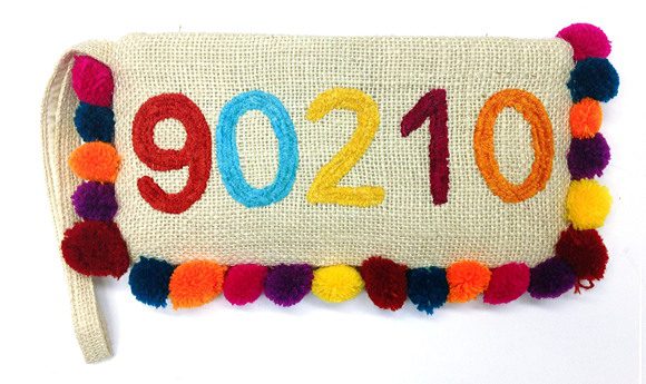 jute-pompom-zipcode-small-wristlet-cpxwp1773-nyc-usa-monogram.jpg